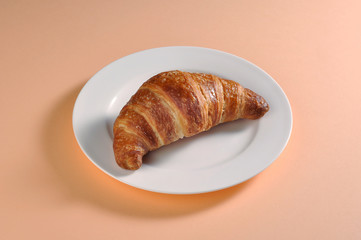 Dish with a croissant