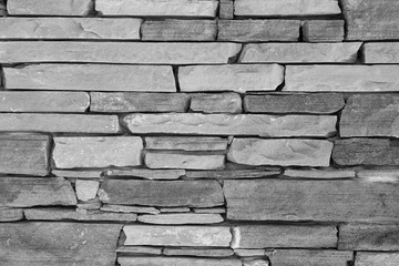 Slim brick wall background, stone texture.