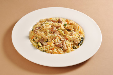 Dish of cous cous and meat