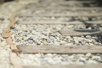 stone on walkway in garden