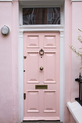 Fototapeta premium Pink door in typical London house