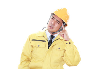頭痛を訴える労働者