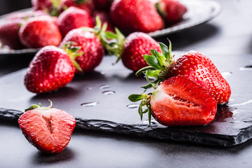 Strawberry. Fresh strawberry. Red strewberry. Strawberry Juice. Loosely laid strawberries in different positions.