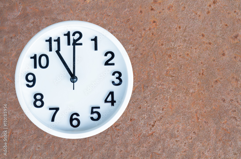 Wall mural clock on steel rusty background