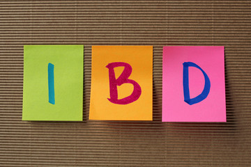 IBD (Inflammatory Bowel Disease) acronym on colorful sticky note