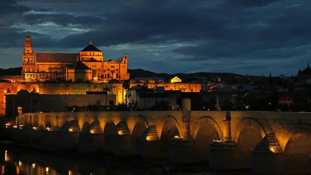 Time lapse of Roman Bridge and Mosque-Cathedral. Cordoba, Spain   