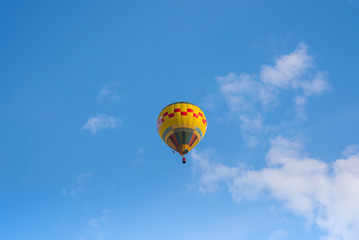 Hot air balloon over blue sky