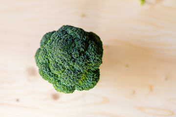 Fresh broccoli on the wooden table