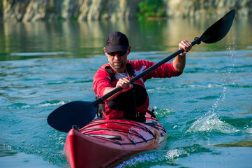 man kayaking on the river sunset01