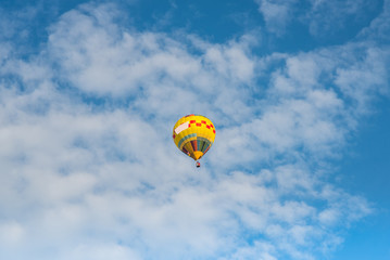 Hot air balloon over blue sky