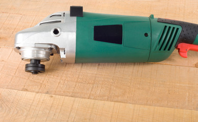 angle grinder wooden background