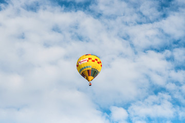 Hot air balloon over blue sky