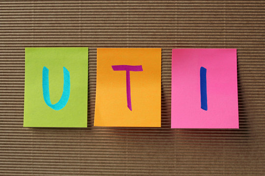 UTI (Urinary Tract Infection) Acronym On Colorful Sticky Notes