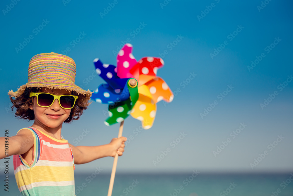 Sticker Child relaxing on the beach