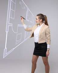 Female architect working with a virtual apartment plan