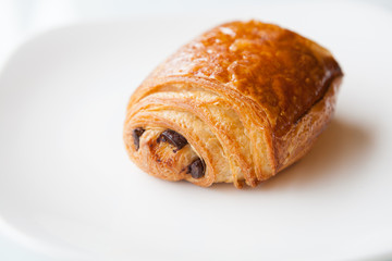 Baked roll on a plate