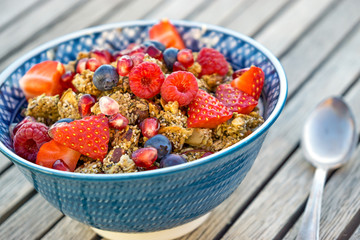 delicious and colorful bowl of granola and fresh berries