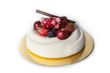 White cake with berries