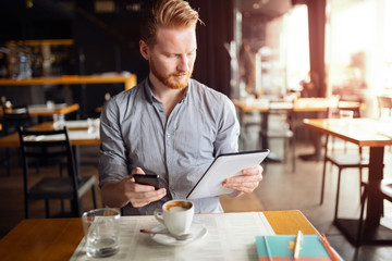 Fototapeta premium Workaholic businessman on break