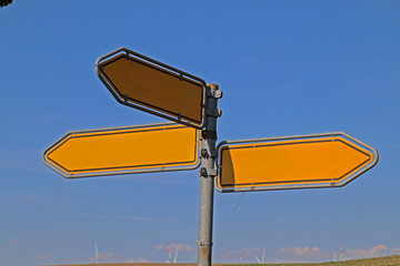 empty three Way Street Sign on blue sky background