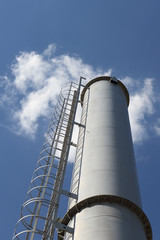 blue sky. cloud. factory chimney. environmental concept. ecology. greenhouse gases
