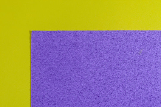 Eva foam ethylene vinyl acetate sponge plush light purple surface on lemon yellow smooth background