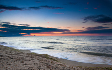 Sunset and sea waves 