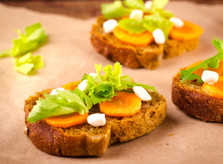 Healthy sandwich with carrots, celery and cheese