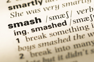 Fototapeta premium Close up of old English dictionary page with word smash