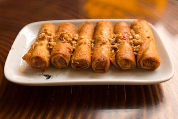 Fried spring rolls with peanut sauce