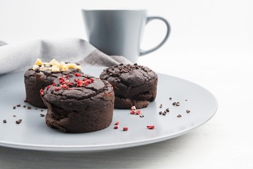 Chocolate muffins with different topping