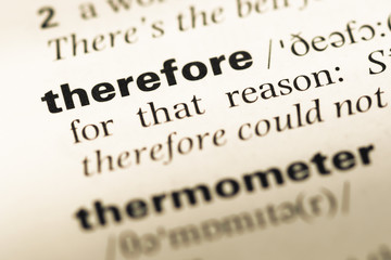 Close up of old English dictionary page with word therefore