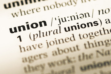 Close up of old English dictionary page with word union