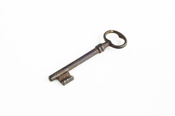 Old iron key on a white background