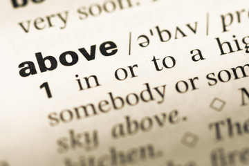 Obraz premium Close up of old English dictionary page with word above