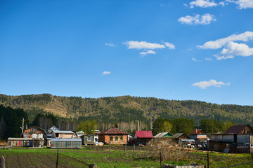 A village house at the foot of the mountains