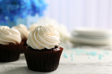 Cupcakes on wooden table