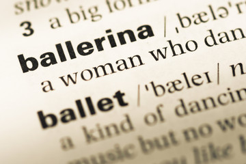 Close up of old English dictionary page with word ballerina