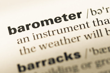 Close up of old English dictionary page with word barometer
