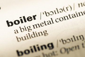 Obraz premium Close up of old English dictionary page with word boiler