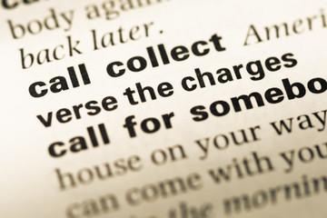 Obraz premium Close up of old English dictionary page with word call collect