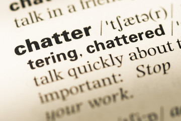 Obraz premium Close up of old English dictionary page with word chatter