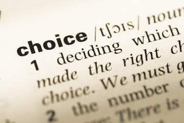 Fototapeta premium Close up of old English dictionary page with word choice