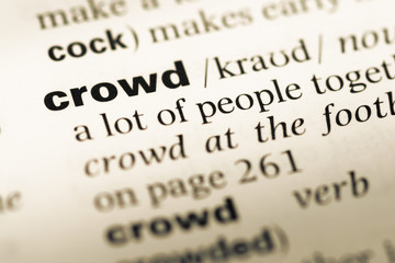 Obraz premium Close up of old English dictionary page with word crowd