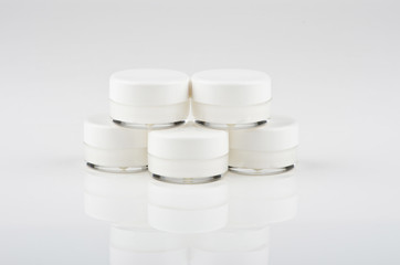 Blank white facial cream jar isolate on white background