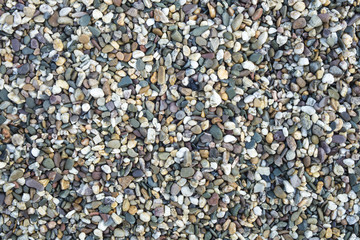 Texture of little rounded colorful stones