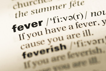 Close up of old English dictionary page with word fever