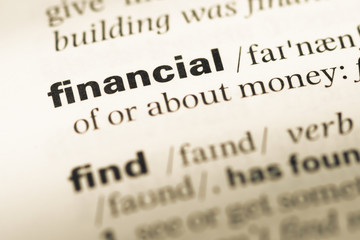Close up of old English dictionary page with word financial