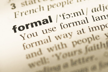 Fototapeta premium Close up of old English dictionary page with word formal