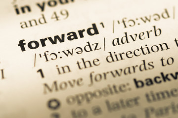 Close up of old English dictionary page with word forward